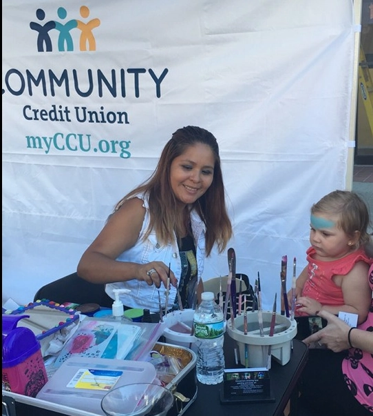 Face painting at a community event