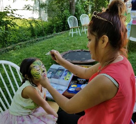 Green tiger face painting design